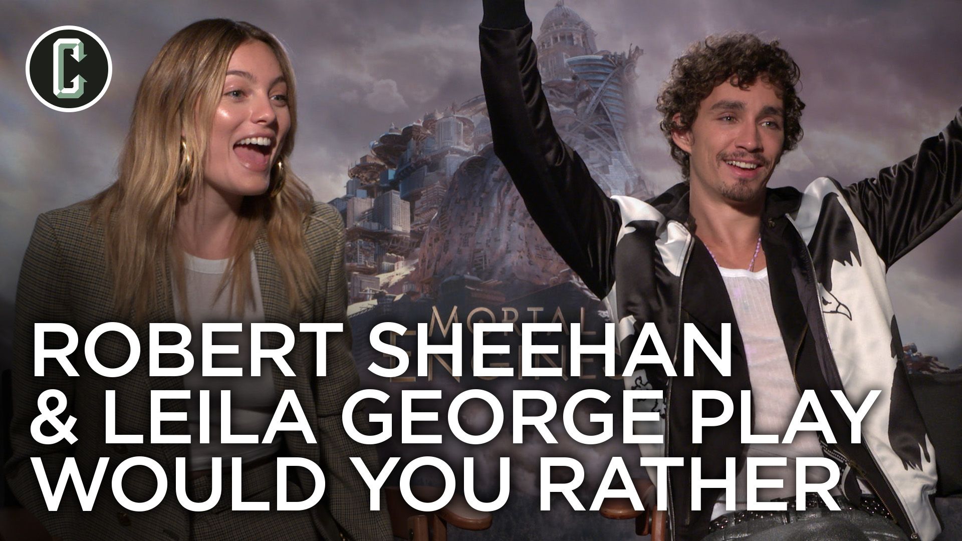 Mortal Engines: Robert Sheehan & Leila George Play Would You Rather | Collider
